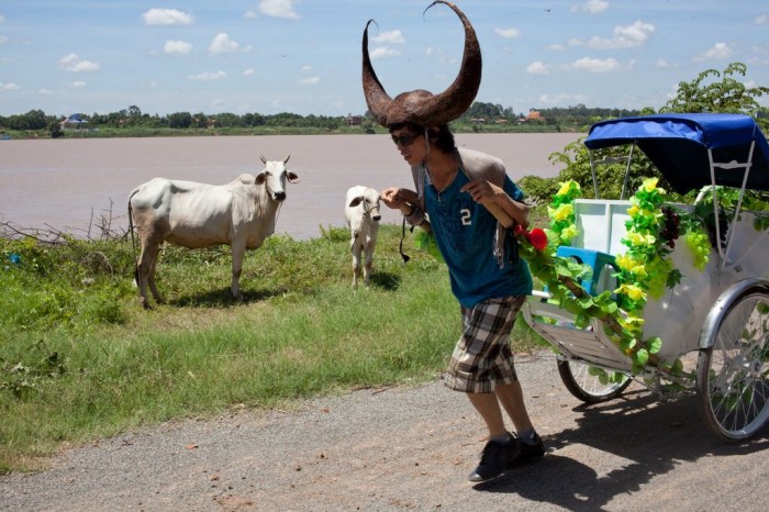 Khvay Samnang, Samnang Cow Taxi Moves Sand, Phnom Penh, 2011, Performance, Courtesy of the Artist